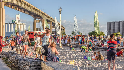 People Playing in the Sand