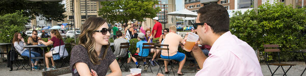 Couple Smiling at Clinton's Dish