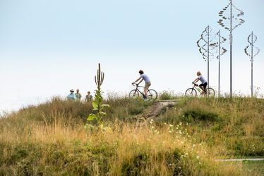 Enlarge image: Bikers Enjoy Bike Trail