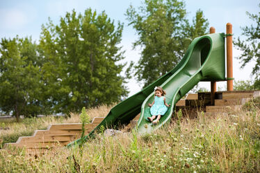 Enlarge image: Young Girl on Slide