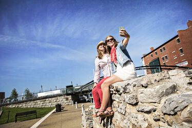 Enlarge image: Girls Taking Selfie at Ruins