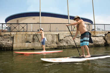 Enlarge image: Couple on Paddle Boards
