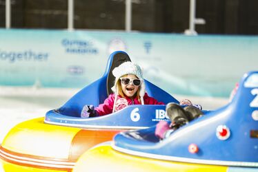 Enlarge image: Kids Riding Ice Bumper Cars
